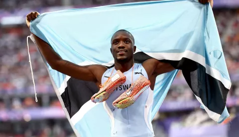 epa11537681 Letsile Tebogo of Botswana celebrates after winning the Men 200m final of the Athletics competitions in the Paris 2024 Olympic Games, at the Stade de France stadium in Saint Denis, France, 08 August 2024. EPA/ANNA SZILAGYI