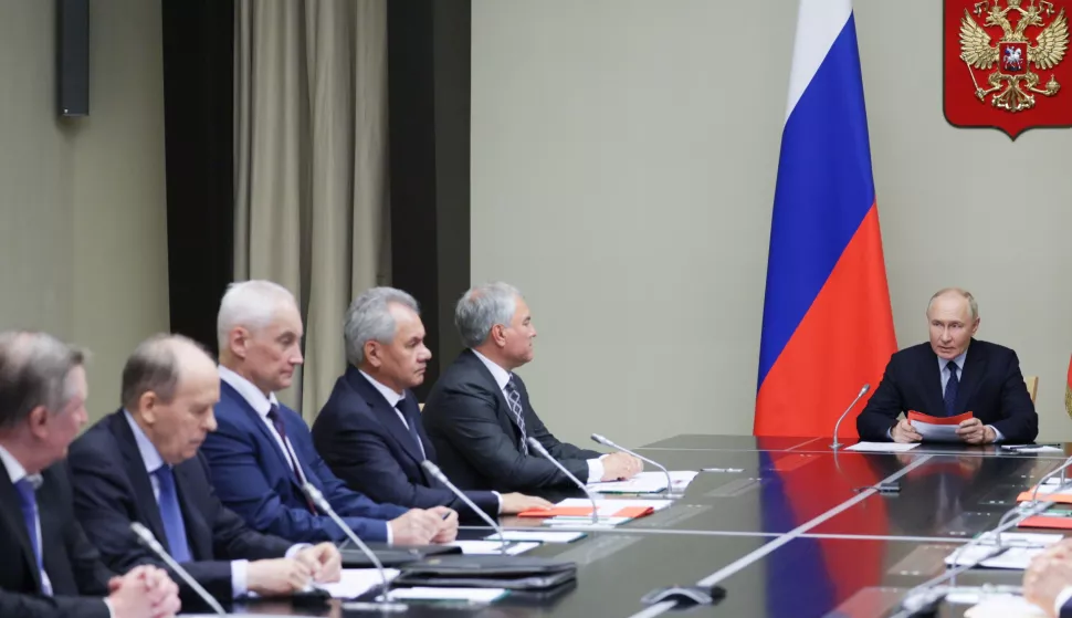 epa11539434 Russian President Vladimir Putin (R) chairs a meeting with members of the Russian Security Council at the Novo-Ogaryovo state residence, outside Moscow, Russia, 09 August 2024. According to Andrei Belostotsky, acting deputy governor of the Kursk region, at least four people were killed as a result of attacks by the Ukrainian Armed Forces in the Kursk region that started on 06 August, while over 3,000 civilians were evacuated from border areas. EPA/ALEKSEY BABUSHKIN/SPUTNIK/KREMLIN POOL/POOL MANDATORY CREDIT