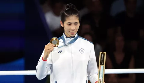 epa11544084 Gold medal winner Lin Yu Ting of Taiwan poses on the podium of the Women's 57kg category of the Boxing competitions in the Paris 2024 Olympic Games, at Roland Garros in Paris, France, 10 August 2024. EPA/YAHYA ARHAB