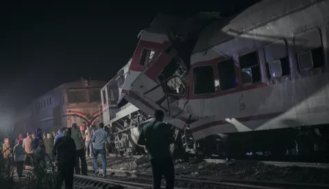 epa11604753 Local residents and rescuers gather at the site where two trains collided, in the city of Zagazig, Sharqiya governorate, Egypt, 14 September 2024. At least three people died and 47 others injured on 14 September after two trains collided in the Sharqiya governorate, north of Cairo, according to a statement by the country's ministry of health. EPA/AHMED ELBAGRA