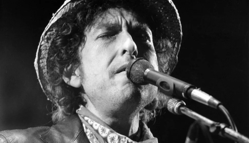 epa05583476 (FILE) A file picture dated 03 June 1984 shows US musician Bob Dylan performing at an open air concert at the Olympic Stadium in Munich, Germany. Dylan won the 2016 Nobel Prize in Literature, the Swedish Academy announced in Stockholm on 13 October 2016. EPA/ISTVAN BAJZAT