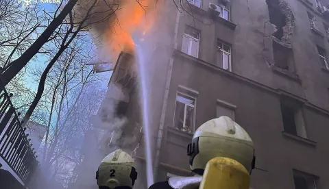 epa11800850 A handout photo made available by the State Emergency Service shows Ukrainian rescuers working at the site of a drone attack on a residential building in Kyiv, Ukraine, 01 January 2025, amid the ongoing Russian invasion. According to the State Emergency Service, at least three people were injured as a result of a Russian drone attack on Kyiv. EPA/STATE EMERGENCY SERVICE HANDOUT HANDOUT EDITORIAL USE ONLY/NO SALES