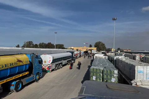 epa11836089 Trucks carrying humanitarian aid bound for the Gaza Strip wait to cross the Rafah border crossing between the Gaza Strip and Egypt, in Rafah, Egypt, 19 January 2024. Israel and Hamas agreed on a hostage release deal and a Gaza ceasefire to be implemented on 19 January 2025. More than 46,000 Palestinians have been killed in the Gaza Strip, according to the Palestinian Ministry of Health, since Israel launched a military campaign in the strip in response to a cross-border attack led by the Palestinian militant group Hamas on 07 October 2023, in which about 1,200 Israelis were killed and more than 250 taken hostage. EPA/MOHAMED HOSSAM