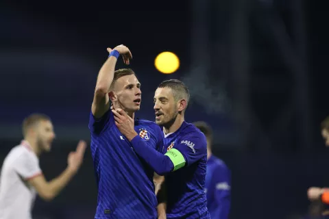 Zagreb, 29.01.2025 - Susret 8. kola nogometne Lige prvaka Dinamo - Milan. Na slici Arijan Ademi i Luka Stojkovi?. foto HINA/ Damir SEN?AR/ ds