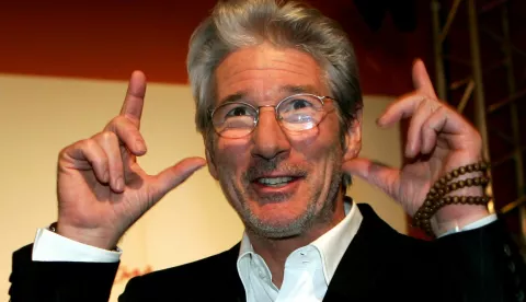 epa00840743 US actor Richard Gere, gestures as he attends the presentation of his new film 'The Hoax', during the first International Film Festival in Rome, Italy on Sunday 15 October 2006. EPA/CLAUDIO ONORATI