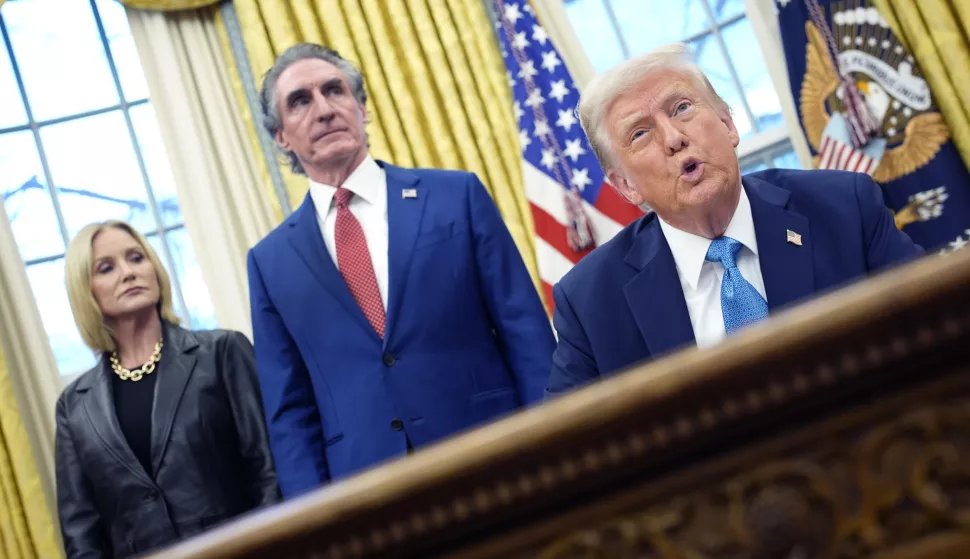 epa11867015 US President Donald Trump (R) speaks to the media after signing an executive order next to new Interior Secretary Doug Burgum (C) in the Oval Office of the White House in Washington, DC, USA, 31 January 2025. EPA/YURI GRIPAS/POOL