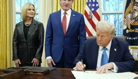 United States President Donald Trump signs Doug Burgum's commission as Interior Secretary in the Oval Office of the White House in Washington, DC on January 31, 2025. Credit: Yuri Gripas/Pool via CNP/AdMedia Photo: CNP/AdMedia/NEWSCOM