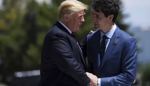 epa07060741 (FILE) - US President Donald J. Trump (L) and Canada's Prime Minister Justin Trudeau (R) shake hands during the Welcome Ceremony at the G7 summit in Charlevoix, Canada, 08 June 2018 (reissued 01 October 2018. Canada and the United States on 30 September struck a trade deal to replace the North American Free Trade Agreement (NAFTA) with the new United States-Mexico-Canada Agreement (USMCA). EPA/NEIL HALL/POOL