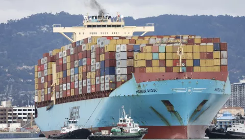 epa11873689 A tugboats guides a container ship at the Port of Oakland in Oakland, California, USA, 03 February 2025. US President Donald Trump has threaten a 25 percent tariff on Mexico and Canada, and a 10 percent tariff with China. Trump has since paused tariffs for 30 days for Mexico and Canada. EPA/JOHN G. MABANGLO