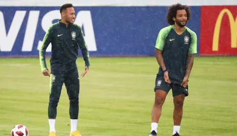 epa06866106 Brazilian players Neymar (L) and Marcelo (R) attend their team's training session in Kazan, Russia, 05 July 2018. Brazil will face Belgium in their FIFA World Cup 2018 quarter final soccer match in Kazan on 06 July 2018. EPA/TATYANA ZENKOVICH