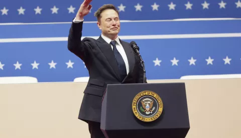 epa11840271 Tesla CEO Elon Musk gestures to the crowds at the Capitol One Arena after his address during inauguration ceremonies for US President Donald Trump in Washington, DC, USA, 20 January 2025. Trump was sworn in for a second term as president of the United States on 20 January. The presidential inauguration was held indoors due to extreme cold temperatures in DC. EPA/ALLISON DINNER