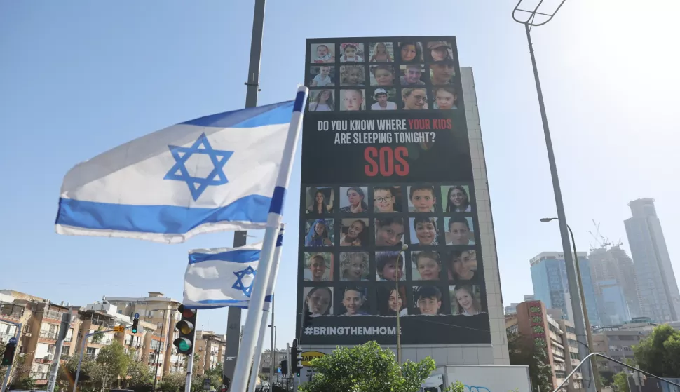 epa10992102 A large billboard showing minor Israeli hostages being held by Hamas in Gaza, on display in Tel Aviv, Israel, 24 November 2023. Israel and Hamas agreed to a 4-day ceasefire agreement, mediated by Qatar, the US, and Egypt, that came into effect at 05:00 AM GMT on 24 November, with 50 Israeli hostages, women and children, to be released by Hamas. 150 Palestinian women and children that were detained in Israeli prisons are to be released in exchange. More than 14.000 Palestinians and at least 1,200 Israelis have been killed, according to the Gaza Government media office and the Israel Defense Forces (IDF), since Hamas militants launched an attack against Israel from the Gaza Strip on 07 October, and the Israeli operations in Gaza and the West Bank which followed it. EPA/ABIR SULTAN