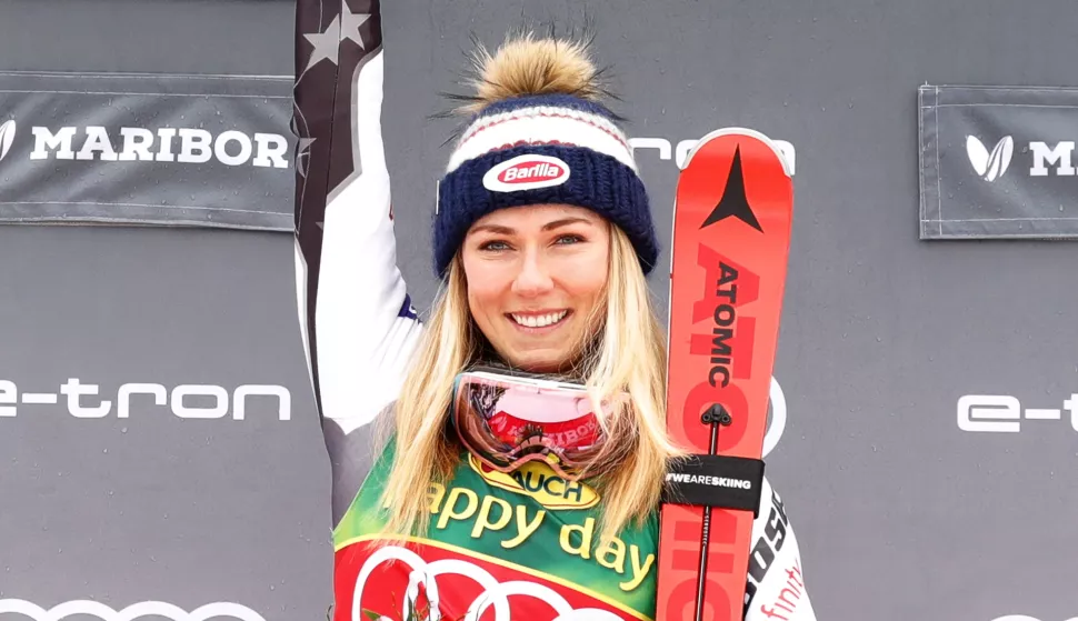 epa07338154 Mikaela Shiffrin of the USA celebrates on the podium after winning the women's Slalom race of the FIS Alpine Skiing World Cup in Maribor, Slovenia, 02 February 2019. EPA/ANTONIO BAT