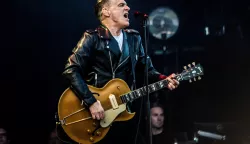 Canadian singer-songwriter and musician Bryan Adams performs at the Tinderbox music festival in Odense, Denmark, June 28, 2024. Ritzau Scanpix/Helle Arensbak via REUTERS ATTENTION EDITORS - THIS IMAGE WAS PROVIDED BY A THIRD PARTY. DENMARK OUT. NO COMMERCIAL OR EDITORIAL SALES IN DENMARK. Photo: Helle Arensbak/REUTERS