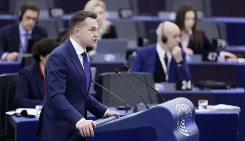epa11887482 Adam Szlapka, Minister for European Union Affairs, speaks during a debate on 'Preparedness for a new trade era: multilateral cooperation or tariffs' at the European Parliament in Strasbourg, France, 11 February 2025. The EU Parliament's session runs from 10 to 13 February 2025. EPA/RONALD WITTEK