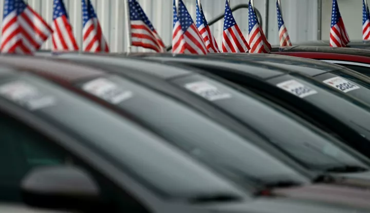 United States flags are set on used cars at a dealership in the Queens borough of New York City, NY, February 3, 2025. President Trump imposed 25% tariff on imports from Mexico and Canada due to take effect after midnight on February 2, but was reminded levies as both countries committed to enforcing control at their borders; Mexico agreed to send 10,00 troops and Canada invest .3b at the shared crossings. Canada is a large supplies of car parts. (Photo by Anthony Behar/SipaUSA) Photo: Anthony Behar/SIPA USA