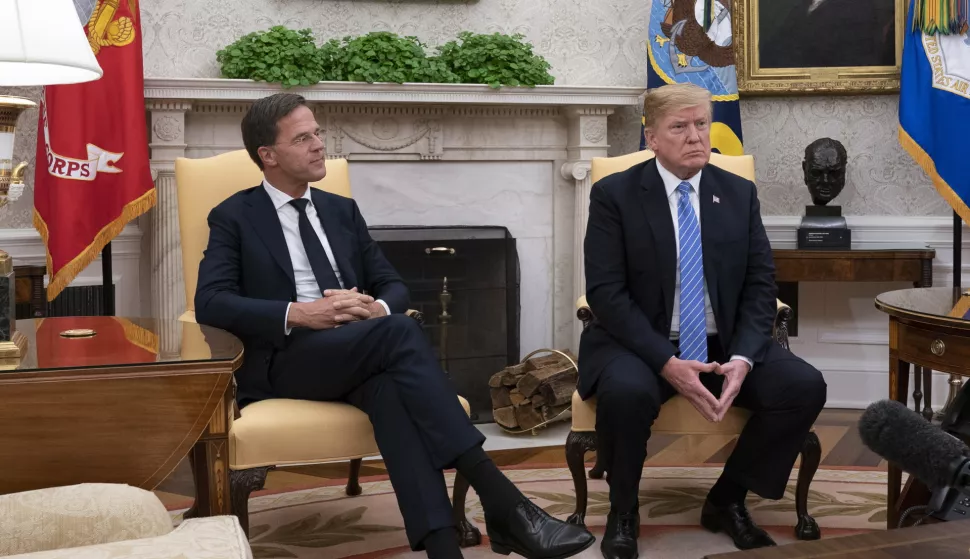 epa06859257 US President Donald J. Trump (R) participates during a meeting with the Prime Minister of The Netherlands Mark Rutte (L) at The White House in Washington, DC, USA, 02 July 2018. EPA/Chris Kleponis/POOL