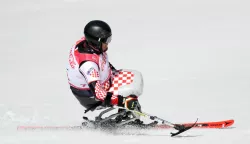 Pjongčang, 11.03.2018 - Hrvatski paraolimpijac Dino Sokolović tijekom utrke superveleslaloma na XII Paraolimpijskim igrama u Pjongčangu.foto HINA/ Damir SENČAR /ds