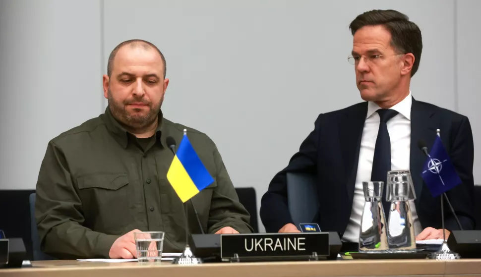 epa11890907 NATO Secretary-General Mark Rutte (R) looks on next to Ukrainian Defense Minister Rustem Umerov during the Ukraine Defense Contact Group meeting at the NATO headquarters in Brussels, Belgium, 12 February 2025. EPA/OLIVIER HOSLET