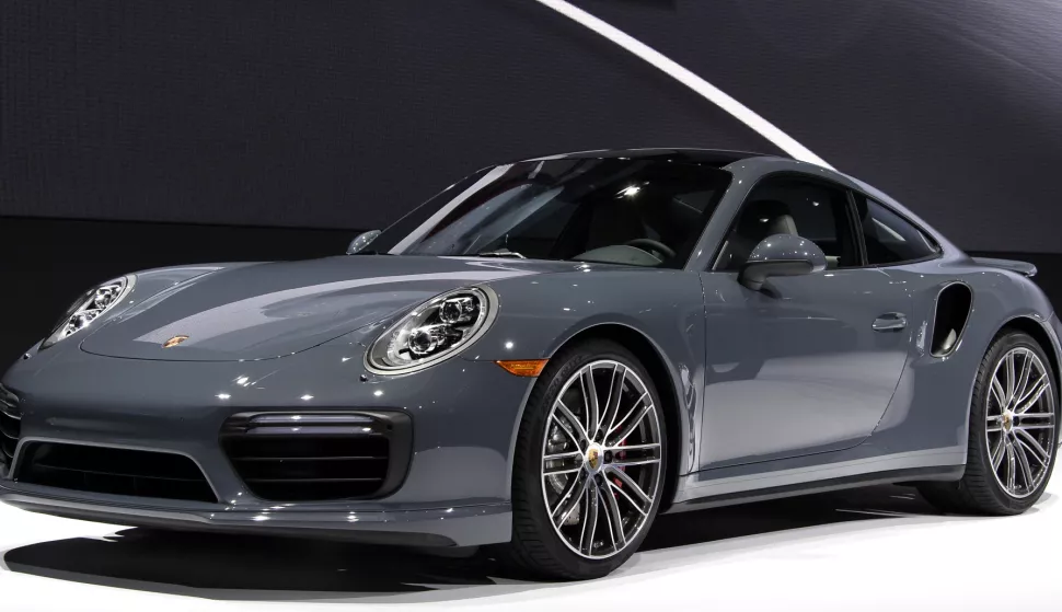 epa07334178 (FILE) The new Porsche 911 Turbo at the North American International Auto Show at Cobo Center in Detroit, Michigan, USA, 11 January 2016 (reissued 31 January 2018). Media reports on 31 January 2018 state that Volkswagen Group has filed a self-report on incorrect fuel consumption and too high carbon dioxide emissions of the sports car Porsche 911 produced in years 2016 and 2017. EPA/LARRY W. SMITH