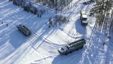epa09714556 A handout still image taken from handout video made available by the Russian Defence Ministry press service shows Russian S-400 mobile long-range surface-to-air missile (LR-SAM) systems developed by Almaz-Antey, train for the protection of airspace in the Sverdlovsk region, Russia, 28 January 2022. About 3,000 servicemen of the Guards Red Banner Combined Arms Army of the Western Military District (ZVO) have begun combat training at training grounds in the Moscow, Rostov, Krasnodar, Yaroslav, Voronezh, Belgorod, Bryansk and Smolensk regions. In December 2021, the Russian Foreign Ministry published draft agreements between the Russian Federation and NATO and the United States on security guarantees. The document says that the United States should not create military bases in the territories of the former Soviet Union countries that are not members of NATO. The Russian Foreign Ministry on 26 January 2022 received a response from the United States and NATO on security guarantees. EPA/RUSSIAN DEFENCE MINISTRY PRESS SERVICE/HANDOUT HANDOUT EDITORIAL USE ONLY/NO SALES