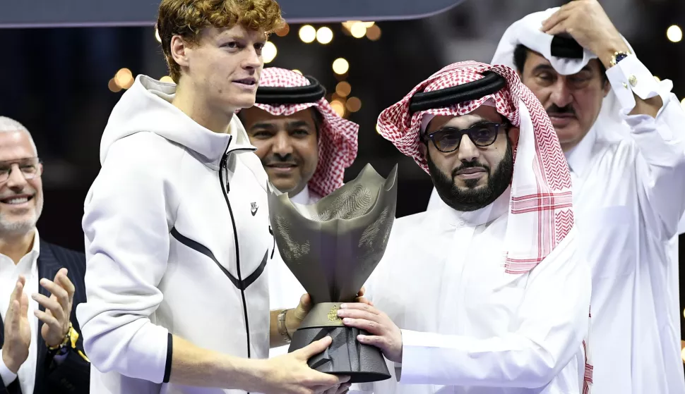 epa11669646 Jannik Sinner of Italy holds his trophy after winning his final match against Carlos Alcaraz of Spain at the Six Kings Slam exhibition tennis tournament in Riyadh, Saudi Arabia, 19 October 2024. EPA/STR