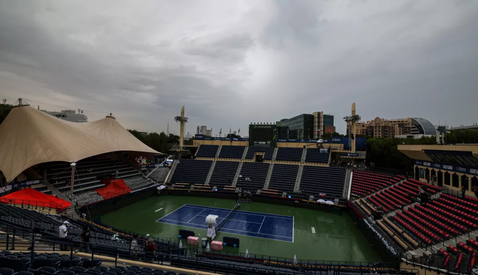 epa11904523 The empty court is seen following a rain break in the second round match which was suspended between during the Jasmine Paolini of Italy and Eva Lys of Germany at the Dubai Duty Free Tennis WTA Championships 2025 in Dubai, United Arab Emirates, 18 February 2025. EPA/ALI HAIDER