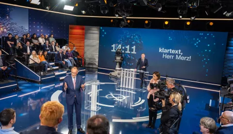 epa11894339 Friedrich Merz (C-L), candidate for chancellor and chairman of the Christian Democratic Union of Germany (CDU), speaks during the ZDF program 'Klartext' in Berlin, Germany, 13 February 2025. Candidates for chancellor from the SPD, CDU, Greens and AfD will answer citizens' questions during the program. Germany will hold federal elections on 23 February 2025. EPA/MICHAEL KAPPELER/POOL