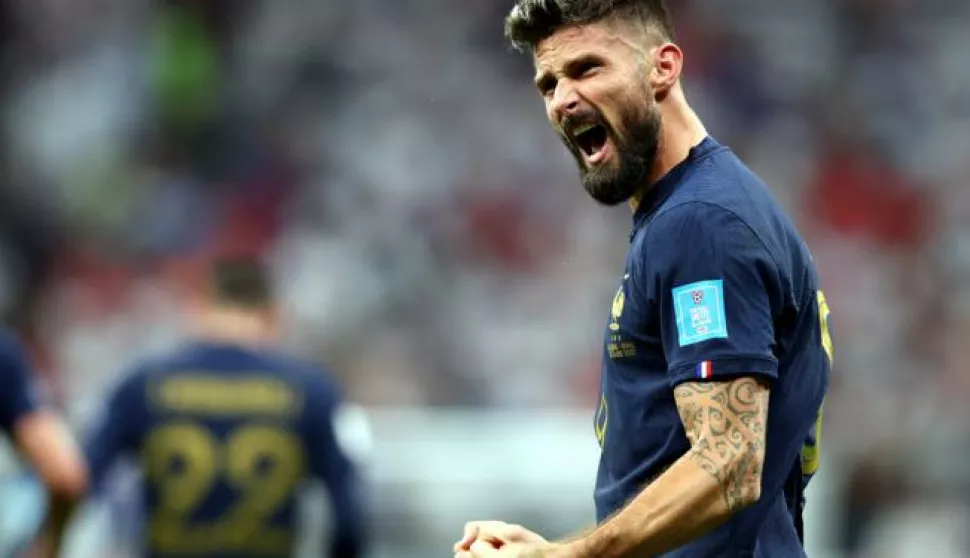 epa10360235 Olivier Giroud of France celebrates after scoring the 2-1 during the FIFA World Cup 2022 quarter final soccer match between England and France at Al Bayt Stadium in Al Khor, Qatar, 10 December 2022. EPA/Tolga Bozoglu