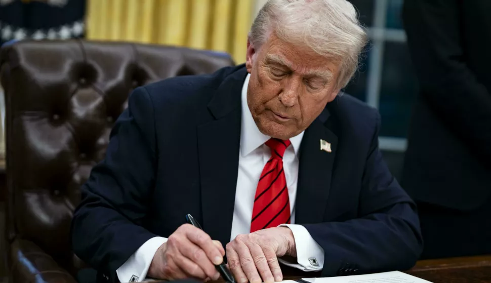 US President Donald Trump signs an executive order in the Oval Office of the White House in Washington, DC, US, on Monday, Feb. 10, 2025. Trump ordered a 25% tariff on steel and aluminum imports, escalating his efforts to protect politically important US industries with levies hitting some of the country's closest allies. Credit: Al Drago/Pool via CNP/AdMedia Photo: CNP/AdMedia/NEWSCOM