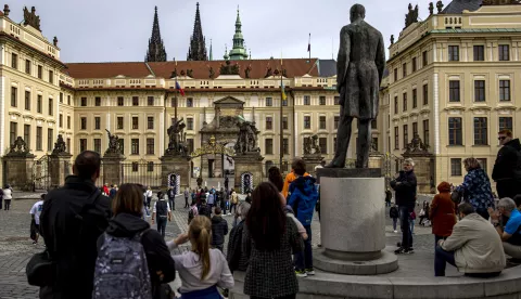 epa10224484 People stand in front of closed Prague Castle in Prague, Czech Republic, 05 October 2022. Prague Castle will host Leaders meeting within the European Political Community on 06 October and an Informal EU Summit on 07 October. EPA/MARTIN DIVISEK