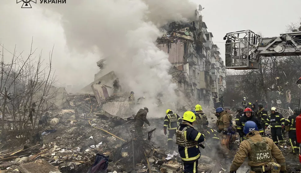 epa11867437 A handout picture made available by the State Emergency Service shows Ukrainian rescuers working at the site of a rocket strike on a residential building in Poltava, Ukraine, 01 February 2025 amid the ongoing Russian invasion. At least three people died and ten others, including a child, were injured as result of the shelling, according to the State Emergency Service report. EPA/STATE EMERGENCY SERVICE HANDOUT HANDOUT EDITORIAL USE ONLY/NO SALES