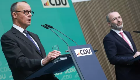 epa11833228 Chairman of the Christian Democratic Union (CDU) party and faction Friedrich Merz (L) and European People's Party (EPP) president Manfred Weber (R) attend a press conference on occasion of the European People's Party (EPP) meeting in Berlin, Germany, 18 January 2025. The EPP Summit takes place in Berlin from 17 to 18 January 2025. EPA/CLEMENS BILAN