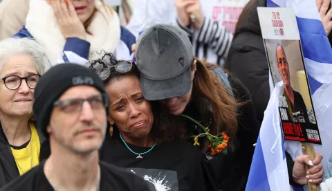 epa11914660 People gather at Hostages Square in Tel Aviv, Israel, 22 February 2025, ahead of the scheduled release of six hostages held by Hamas in Gaza. The Israeli military expects Hamas to release the six Israeli hostages from two separate locations in Gaza. EPA/ABIR SULTAN