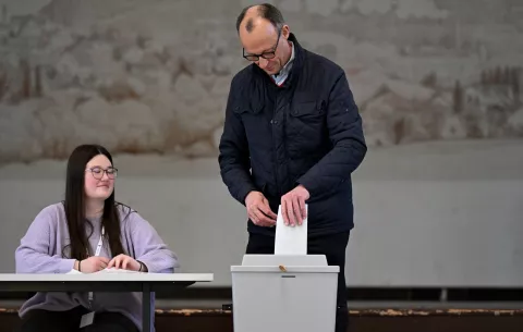 epa11917765 Chairman of the Christian Democratic Union (CDU) party and chancellor candidate Friedrich Merz (R) casts his vote for the general election, at a polling station in Arnsberg, Germany, 23 February 2025. About 60 million people are eligible to vote in the German elections for a new federal parliament, the 21st Bundestag. EPA/FABIAN STRAUCH