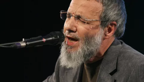 Benefit dinner for Gaza Yusuf Islam, also known as Cat Stevens, performs on stage at a Medical Aid for Palestinians (MAP) benefit evening for Gaza, held at the Grosvenor House Hotel in central London.