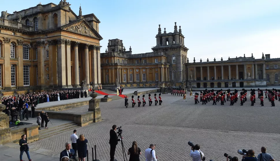 epa06884384 Melania Trump, US President Donald J. Trump, British Prime Minister Theresa May and her husband Philip attend a welcoming ceremony at Blenheim Palace, Oxfordshire, Britain, 12 July 2018. US President Trump is on a three-day working visit to the United Kingdom, first trip to the country as US president. EPA/ANDY RAIN