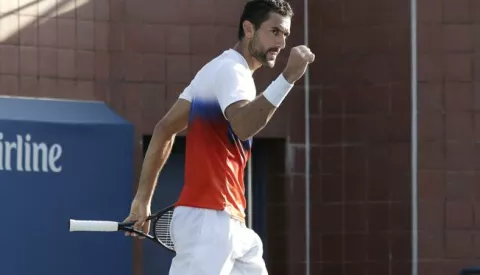 epa10158430 Marin Cilic of Croatia gestures after winning a game against Daniel Evans of Great Britain in their third round match during the US Open Tennis Championships at the USTA National Tennis Center in Flushing Meadows New York, USA, 03 September 2022. The US Open runs from 29 August through 11 September. EPA/Peter Foley