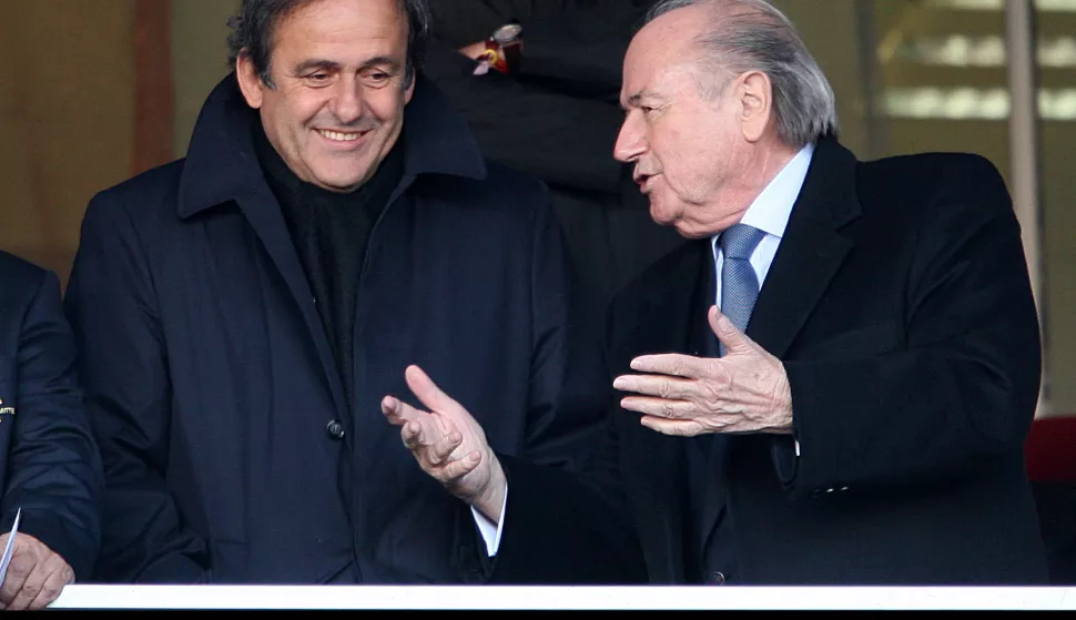 UEFA President Michel Platini (left) and FIFA President Sepp Blatter (right) in the stands Photo: Press Association/Pixsell