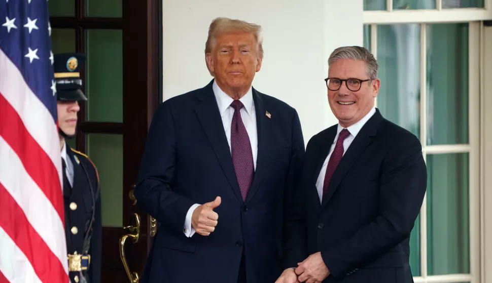 epa11928392 US President Donald Trump (L) greets British Prime Minister Keir Starmer (R) at the White House Washington, DC, USA, 27 February 2025. EPA/WILL OLIVER
