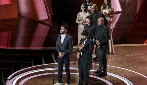 epa11936681 Basel Adra (L) and Yuval Abraham (R) accept the Oscar for Best Documentary Feature Film for 'No Other Land' during the 97th annual Academy Awards ceremony at the Dolby Theatre in the Hollywood neighborhood of Los Angeles, California, USA, 02 March 2025. EPA/ALLISON DINNER