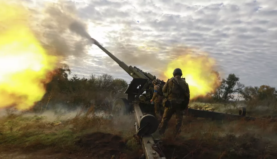epa11910097 (FILE) - Ukrainian servicemen shoot from a captured Russian 152.4 mm howitzer Msta-B on a front line near the Kupyansk city of Kharkiv's area, Ukraine, 06 October 2022 (reissued 20 February 2025). The war in Ukraine, which began with Russia's full-scale invasion in 2022, reaches its third anniversary on 24 February 2025. The conflict has caused widespread destruction and a humanitarian crisis. EPA/SERGEY KOZLOV