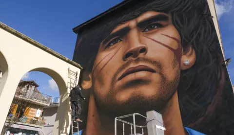 Neapolitan street artist Jorit Agoch has created his new mural in quarto, in the province of Naples, depicting the face of Diego Armando Maradona who died on 25 November 2020, Dique Luj?n, Argentina, former ssc napoli player from 1984 to 1991. The figure of maradona in naples and the province is revered as a saint. /IPA/PIXSELL
