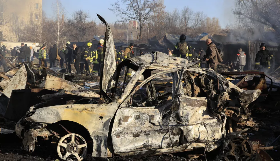 epaselect epa11946512 A damaged car at the site of Russian shelling near a residential building in Kharkiv, northeastern Ukraine, 07 March 2025, amid the Russian invasion. At least eight people were injured after Russian missile strikes hit near a three-story building and a critical infrastructure facility in Kharkiv, the Mayor of the city Ihor Terekhov wrote on telegram. Russia launched 194 attack drones and 67 missiles across Ukraine overnight, with Ukrainian air defenses shooting down 36 rockets and 186 drones, according to the Air Force Command of Ukraine. EPA/SERGEY KOZLOV