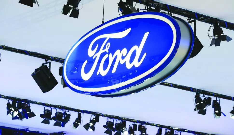 epa05141390 (FILE) A file photo dated 02 April 2015 showing the Ford car company logo on display at a press event at the 2015 New York International Auto Show at the Jacob K. Javits Center in New York City, New York, USA. Reports on 03 February 2016 state US carmaker Ford has announced it will slash hundreds of jobs, mainly in Germany and Britain, in an attempt to cut costs by 200 million dollars per year and increase profitability. It is hoped the voluntary redundancy scheme - mostly involving managerial positions - will increase profit margins. The exact number of redundancies will depend on how many people accept severance packages, the company said. The announcement comes after Ford returned to profit for the first time in several years in 2015, recording a pre-tax profit of 259 million dollars. The loss-making years prior to 2015 prompted Ford to shutter three factories in Britain and Belgium. EPA/JASON SZENES