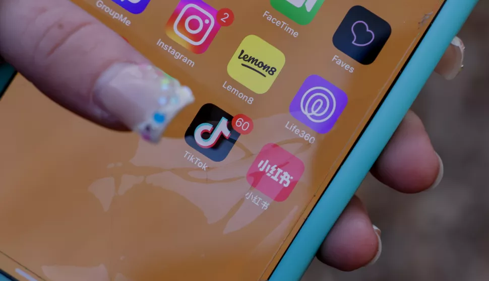 epa11832179 An iPhone user with the TikTok app and other social media apps in Decatur, Georgia, USA, 17 January 2025. The US Supreme Court has backed a law banning the Chinese-owned TikTok app in the United States unless it is sold to a US-based company by 19 January 2025. EPA/ERIK S. LESSER