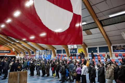 epa11956559 People line up to vote during the parliamentary election at the Godthaabshallen sports hall, in Nuuk, Greenland, 11 March 2025. Greenland residents will vote on 11 March to elect 31 members to the Inatsisartut, the Greenlandic parliament, with six parties contesting. EPA/MADS CLAUS RASMUSSEN DENMARK OUT