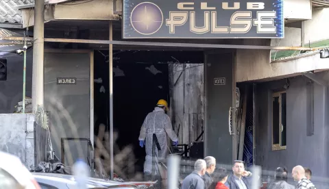 epa11967815 Investigators enter the 'Club Pulse' nightclub after a fire in Kocani, Republic of North Macedonia, 16 March 2025. A fire at a discotheque in Kocani in the early hours of 16 March 2025 claimed the lives of at least 50 people and left over 100 injured, according to initial reports from the Directorate for Protection and Rescue and the Center for Crisis Management. EPA/GEORGI LICOVSKI