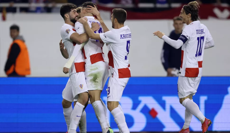 Split, 20.03.2025. - Prvi dvoboj ?etvrtfinala nogometne Lige nacija Hrvatska - Francuska. Na slici hrvatski nogometa?i slave pogodak Ivana Peri?i?a za 2:0. foto HINA/ Damir SEN?AR/ ua