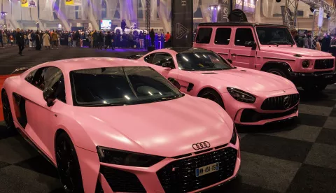 epa11085896 Pink Audi and Mercedes cars on display during a press day of the first edition of the Brussels Auto Show 2024 in the Expo in Brussels, Belgium, 17 January 2024. Already 80,000 tickets have been sold due to the great interest of the public in the new concept of Brussels Auto Show 2024. Over 100 companies present motorbikes, second-hand, chrome, hydrogen and solar cars. The Belgian Air Force displays an F-35 simulator and an F16 fighter jet. EPA/OLIVIER MATTHYS